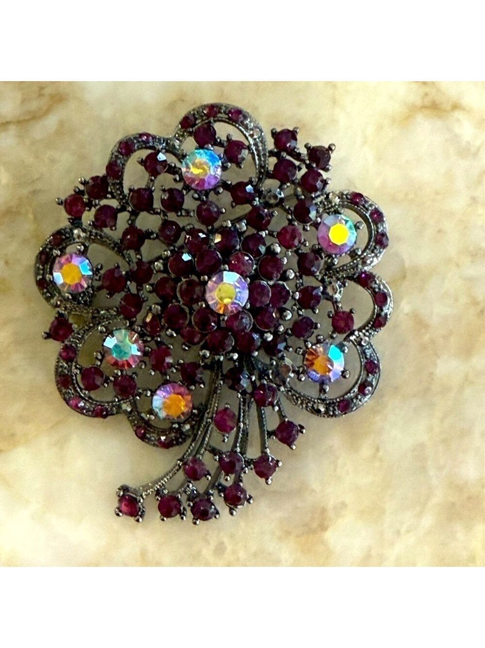 Vintage Silver and Purple Brooch with Intricate Design faceted glass pronged
